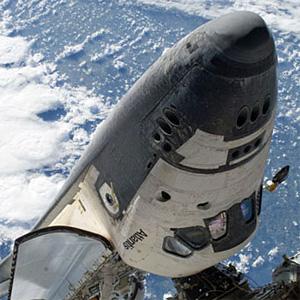 宇航員在太空漫步時(shí)拍的“亞特蘭蒂斯”號(hào)和國(guó)際空間站對(duì)接圖